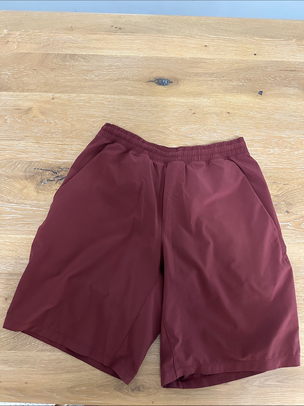 Lululemon mens athletic shorts. Dark red. Size medium